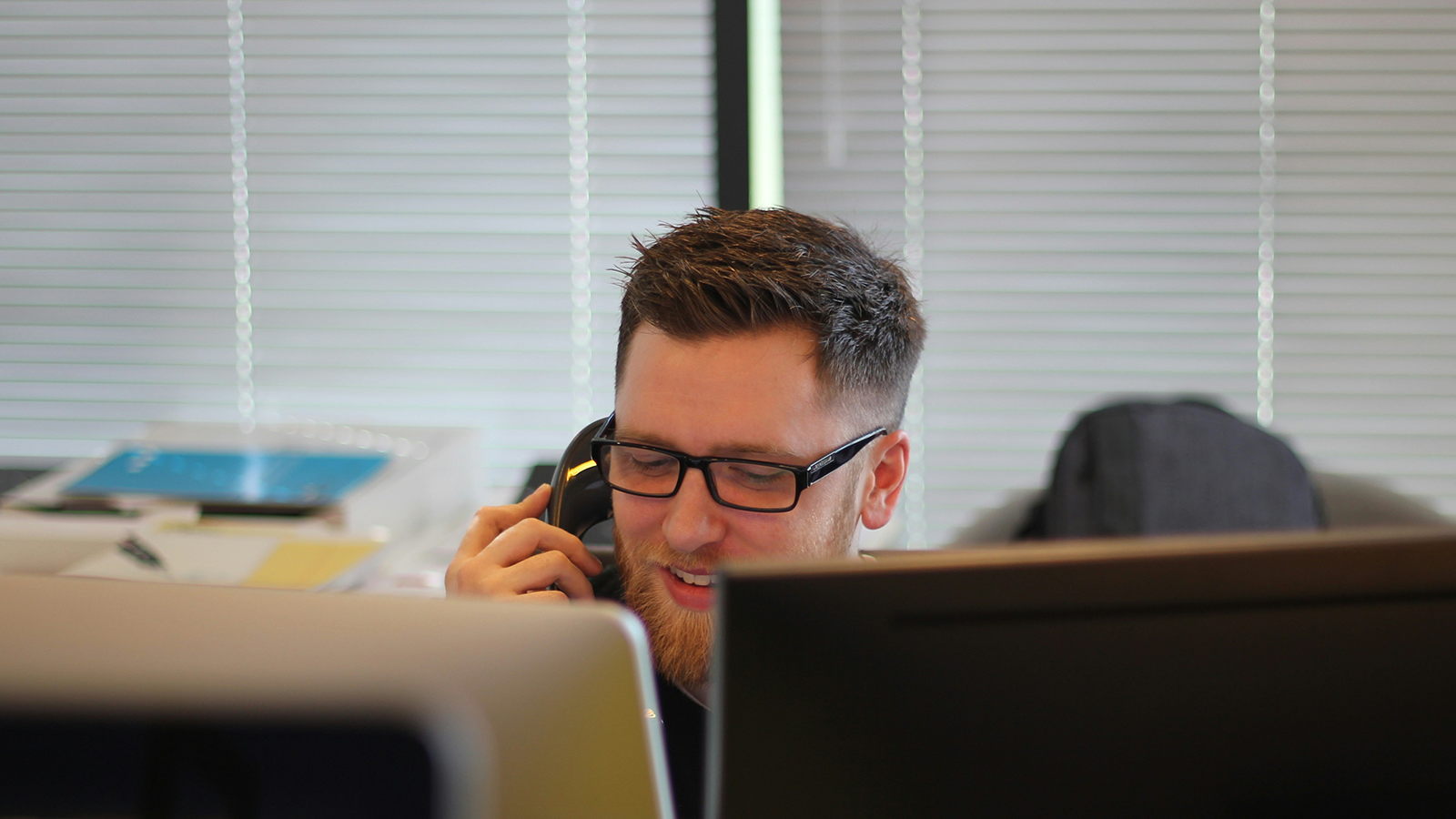 Sales professional communicating with a prospective customer during lead follow-up